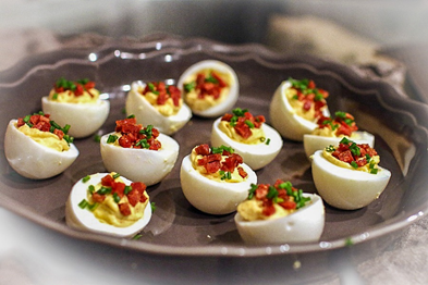 Chorizo cocktail eggs on serving plate