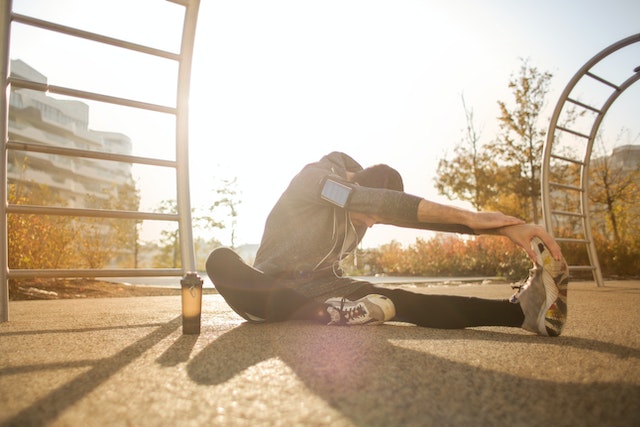 Man stretching before run